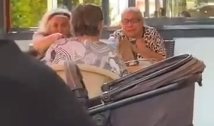 Sıcaktan bunalan kadınların vantilatör kavgası kamerada